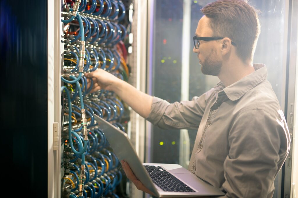 Engineer analyzing server connections